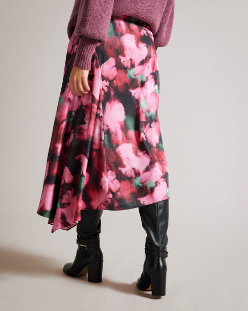 LIZZIEE-Skirts-Effortlessly beautiful, the LIZZIEE skirt is crafted from viscose satin with an A-line silhouette and charming petal print. The gathered side panel puts an extra swish in your step, while the bias cut fabric ensures a flattering fit.This product is made using 46% LENZING™ ECOVERO™ Viscose fibres. LENZING™ ECOVERO™ fibres are derived from sustainable wood and pulp, sourced from certified and controlled forests, with up to 50% lower emissions and water impact compared to generic viscose. LENZIN